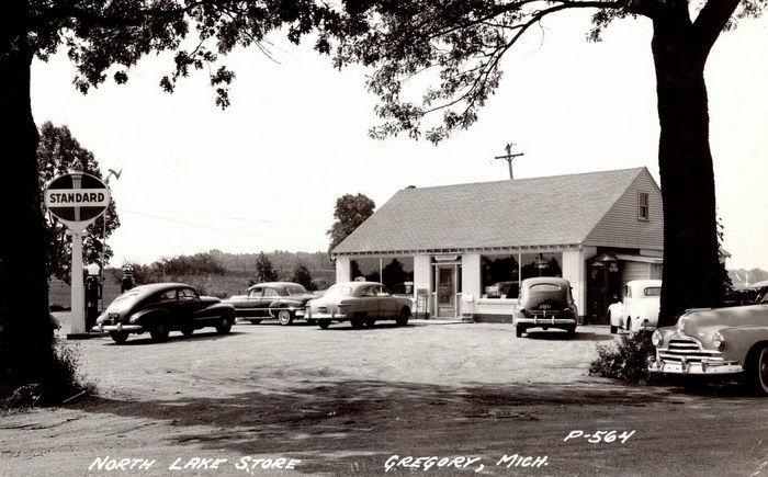 Gregory Michigannorth Lake Grocery Storestandard Crown Gas Pumpcars1949 Rppc (newer photo)